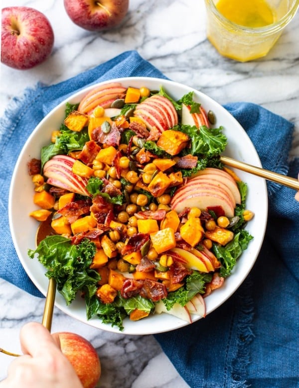 Roasted Sweet Potato & Chickpea Kale Apple Salad with Bacon in a bowl
