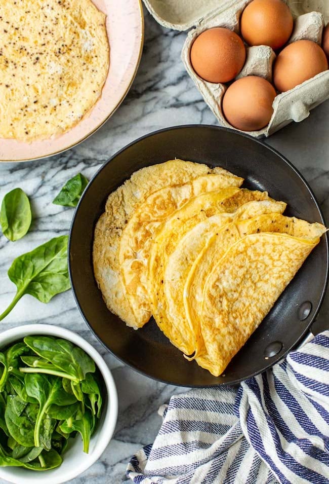 Keto egg wraps folded in a pan