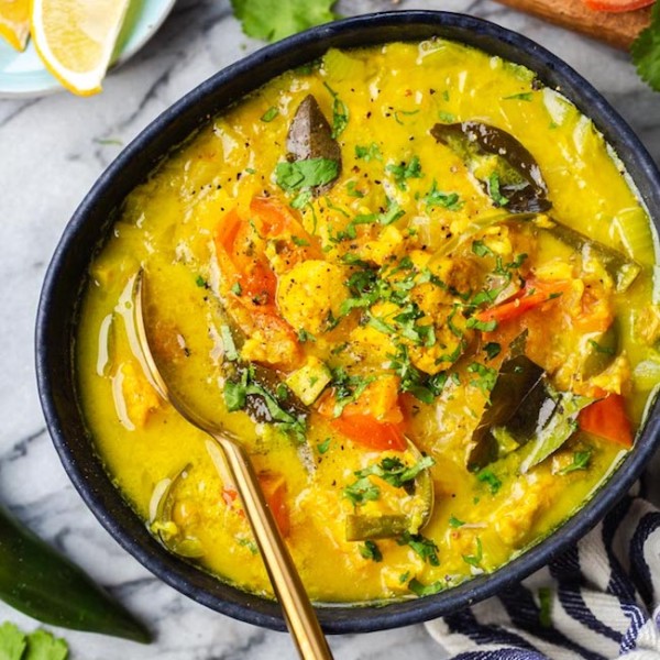 fish molee in a blue bowl