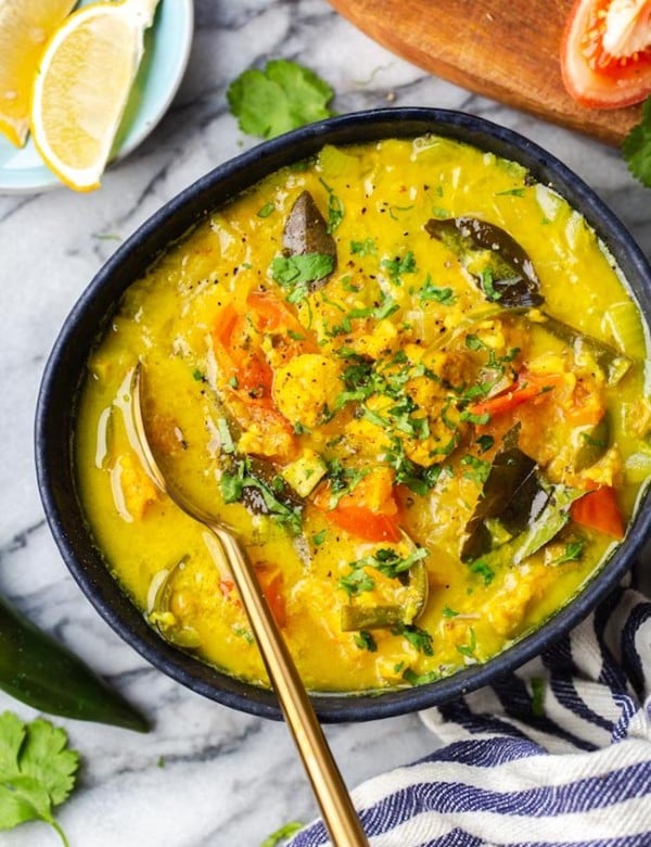 fish molee in a blue bowl