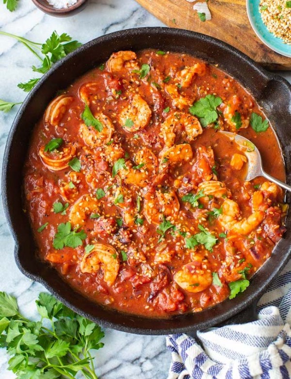 Mediterranean Shrimp Stew with a serving spoon