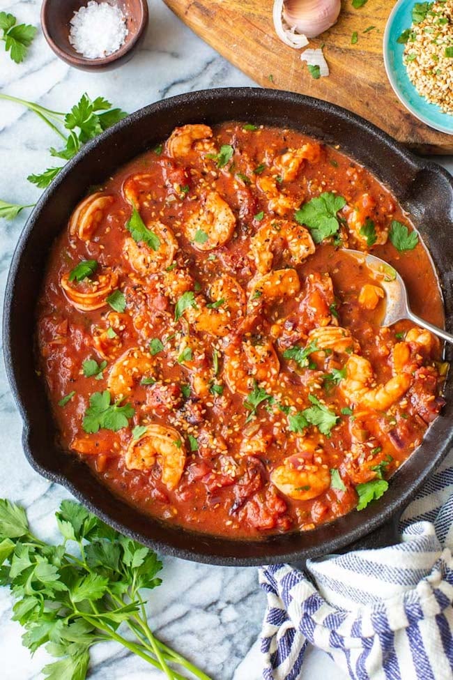 Mediterranean Shrimp Stew with a serving spoon