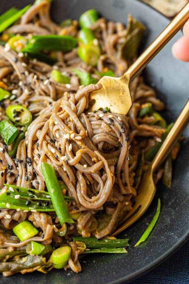 fork picking up Spring Onion Peanut Noodles 