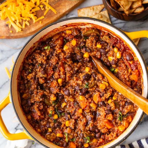 Black Bean Quinoa Veggie Chili in a yellow cooking pot