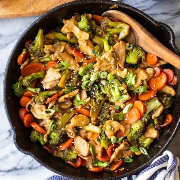 Teriyaki Chicken Broccoli Stir Fry in a cast iron pan