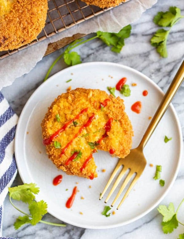 Gluten Free Salmon Cakes topped with sriracha