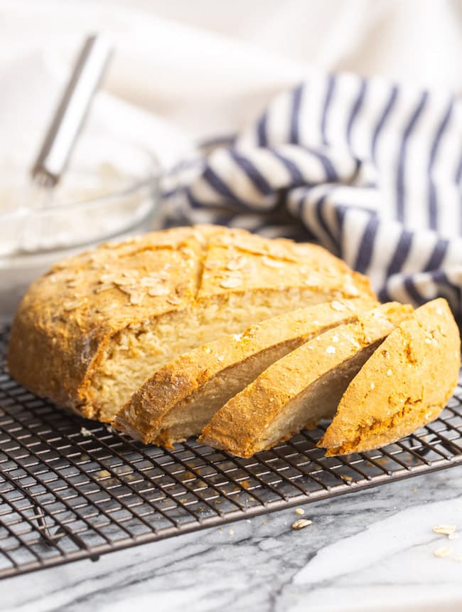 Gluten-Free-Soda-Bread sliced and cooling on a wire rack