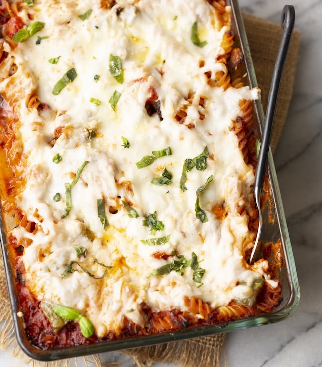 pasta casserole topped with vegan cheese 
