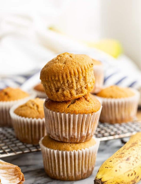 three gluten free banana muffins stacked