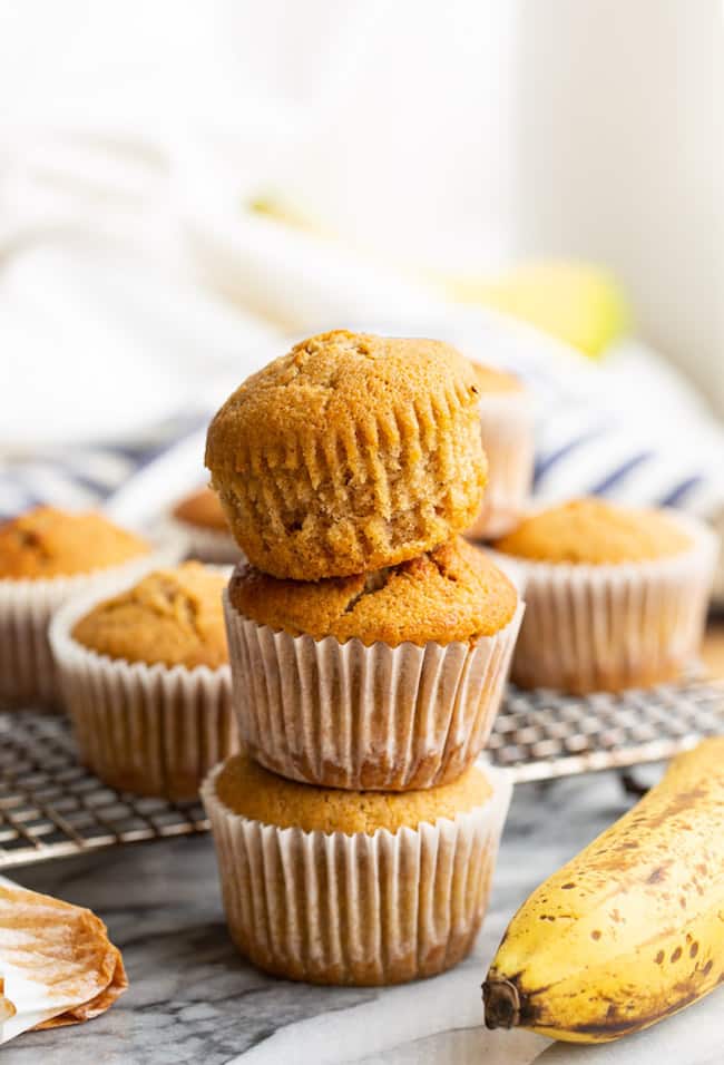 three Gluten Free Banana Muffins stacked 