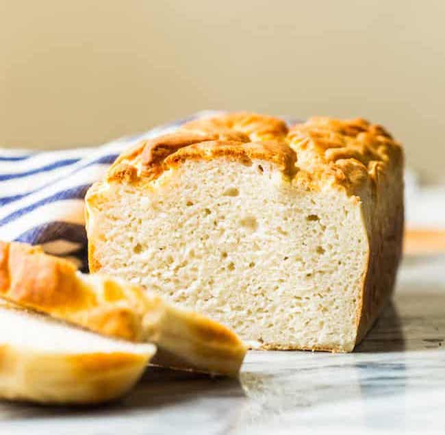 cropped gluten free bread on marble surface