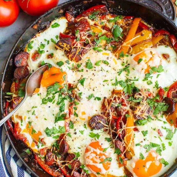 peperonata with eggs in a skillet