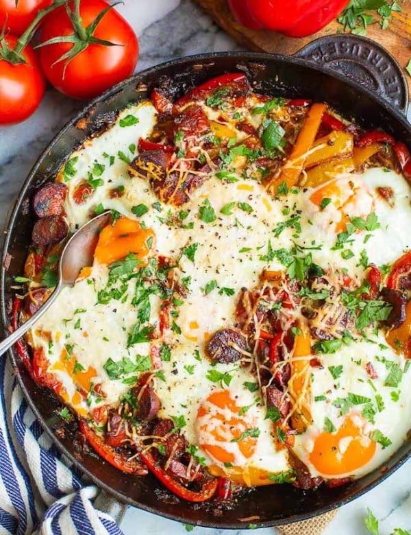 peperonata with eggs in a skillet