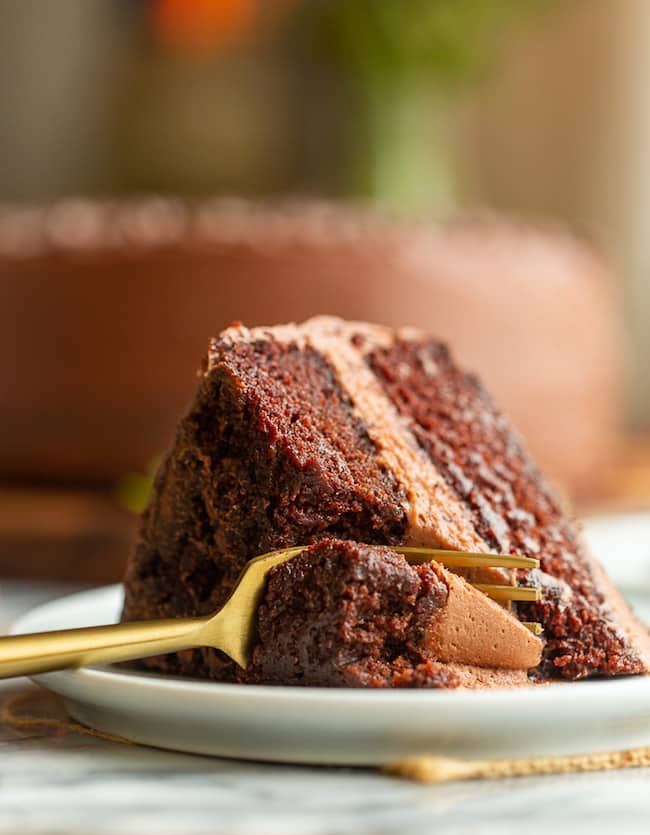 Gluten Free Vegan Chocolate Cake slice with a bite taken out