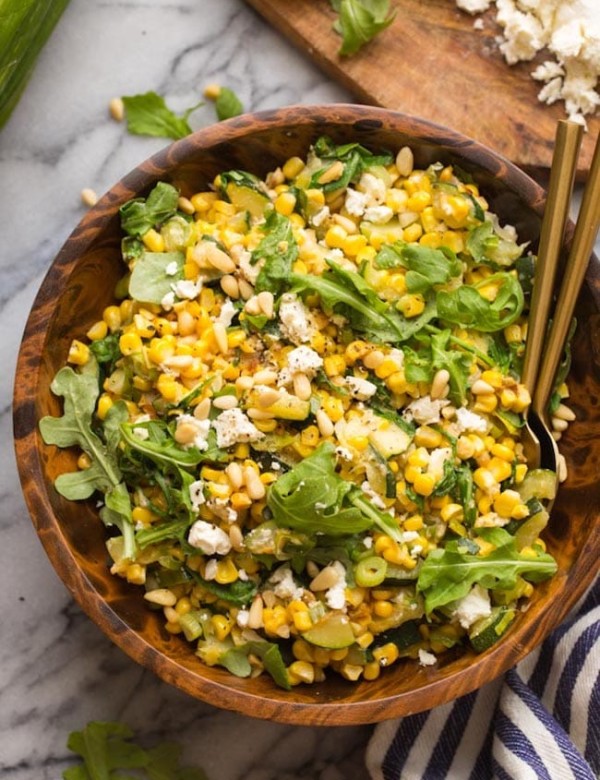 Sautéed Corn & Courgette Salad in a wooden salad bowl