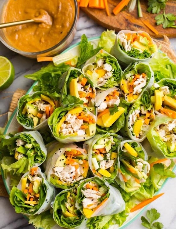 summer rolls cut in half on a platter