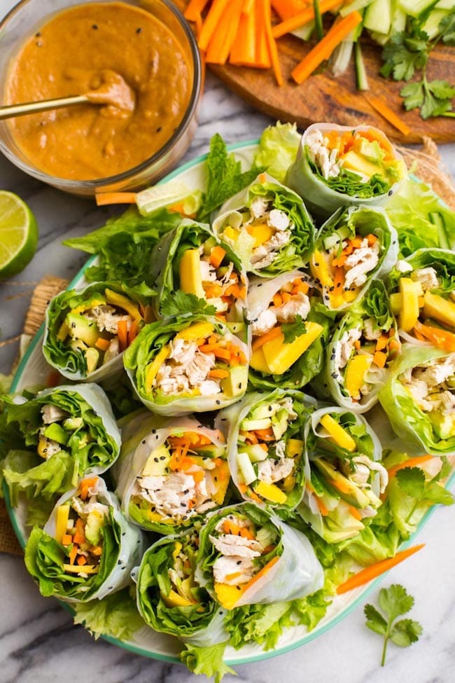 summer rolls cut in half on a platter