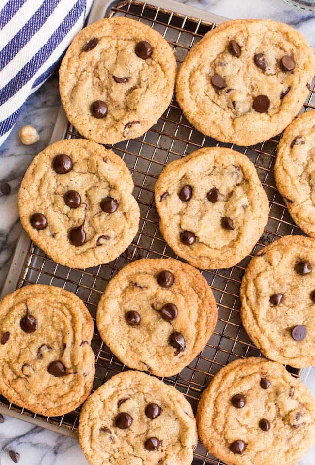 Chocolate Chip Hazelnut Cookies on a wire cooling rack