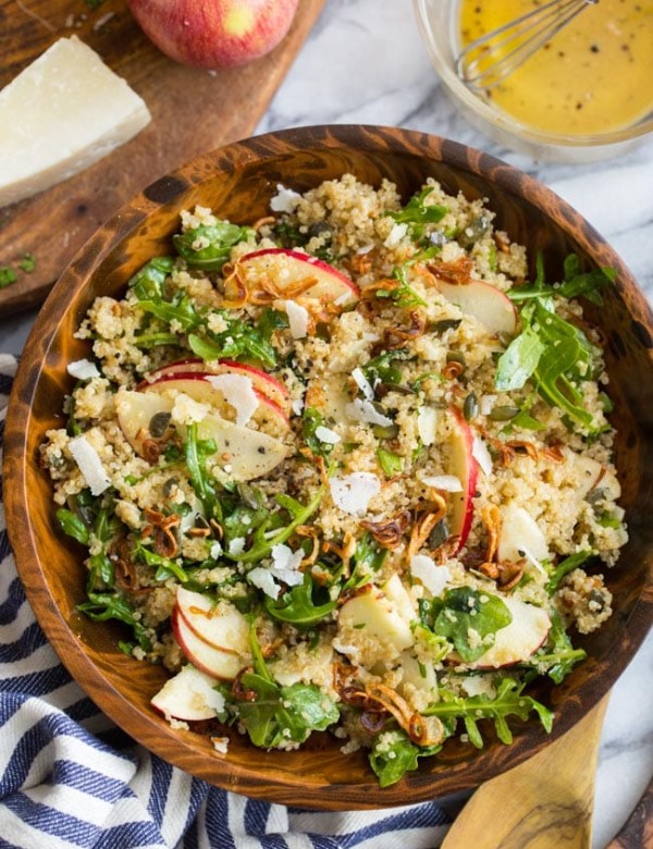 Honey Mustard Quinoa Apple Salad with Crispy Shallots mixed in a wooden bowl