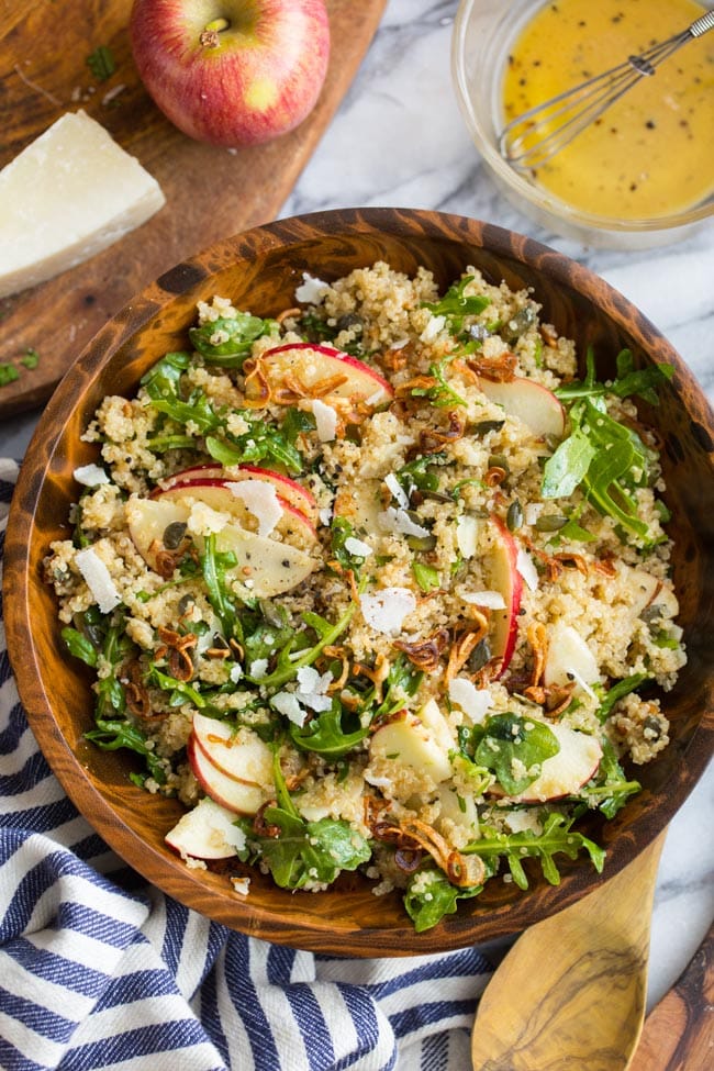 Honey Mustard Quinoa Apple Salad with Crispy Shallots mixed up in a wooden bowl