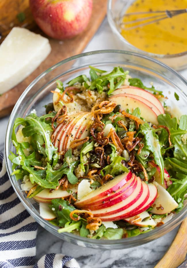 Honey Mustard Quinoa Apple Salad with Crispy Shallots in a salad bowl before mixed