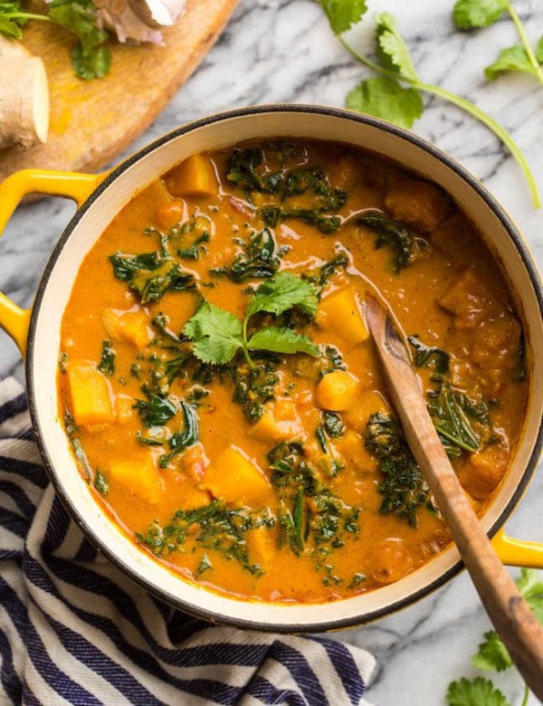 Peanut & Kale Butternut Squash Curry in a yellow pot