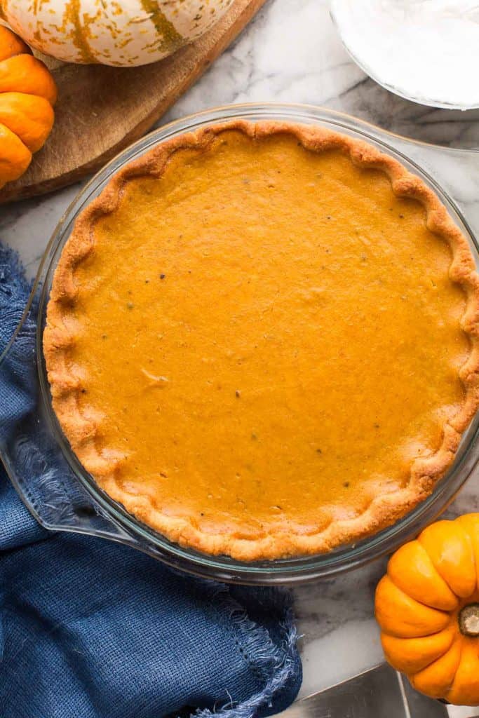 Paleo Pumpkin Pie in a glass pie plate 