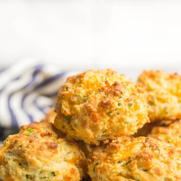 cheesy gluten free biscuit piled on a platter