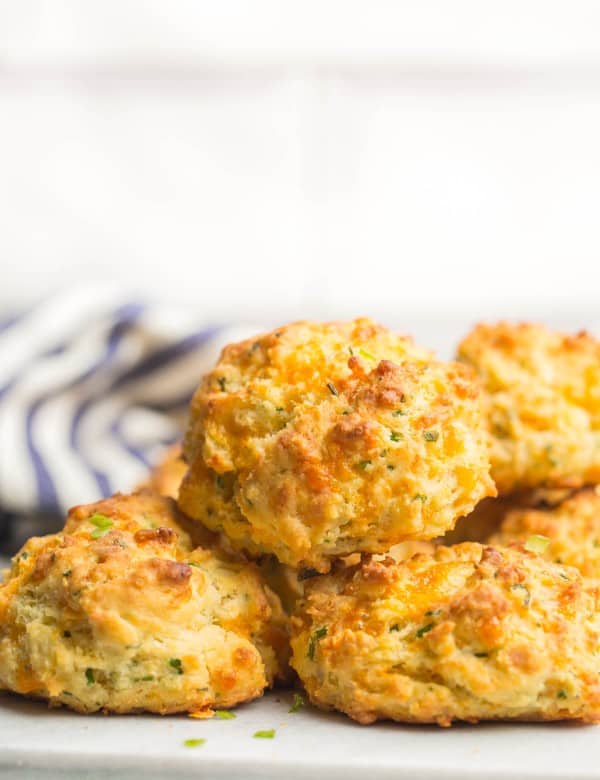 cheesy gluten free biscuit piled on a platter