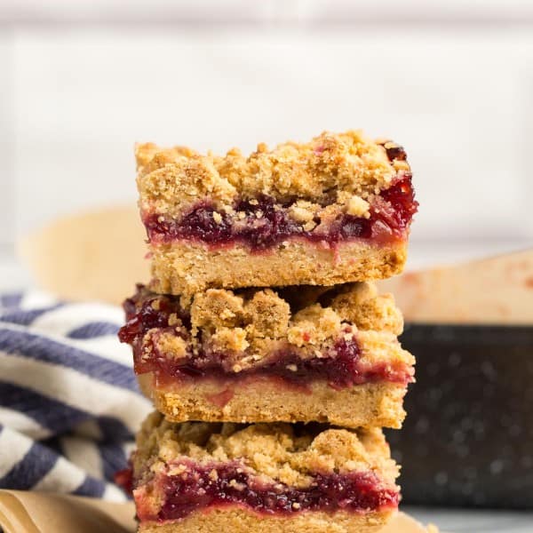 three Gluten Free Cranberry Crumble Bars stacked