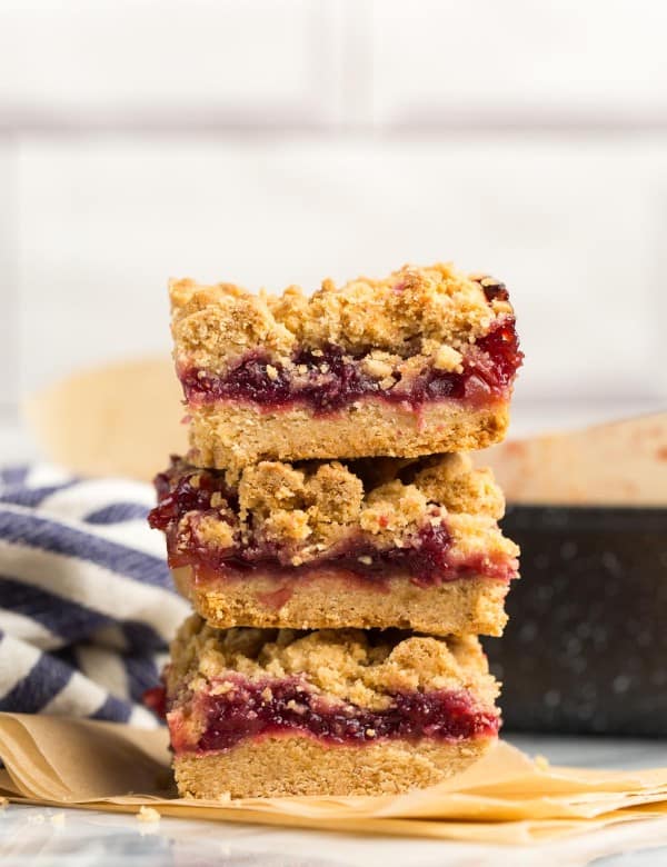 three Gluten Free Cranberry Crumble Bars stacked