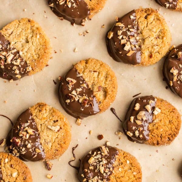 Toasted Pecan Almond Flour Shortbread Cookies drying on a piece of baking paper