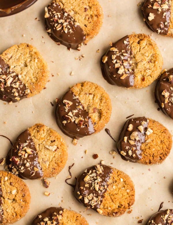 Toasted Pecan Almond Flour Shortbread Cookies drying on a piece of baking paper