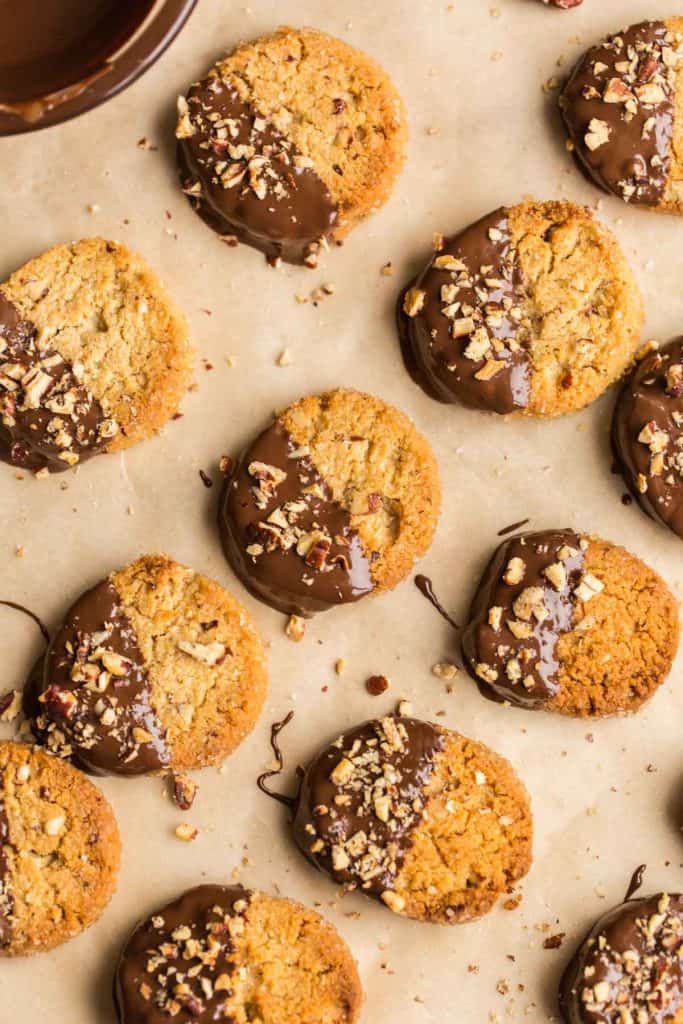 Toasted Pecan Almond Flour Shortbread Cookies drying on a piece of baking paper