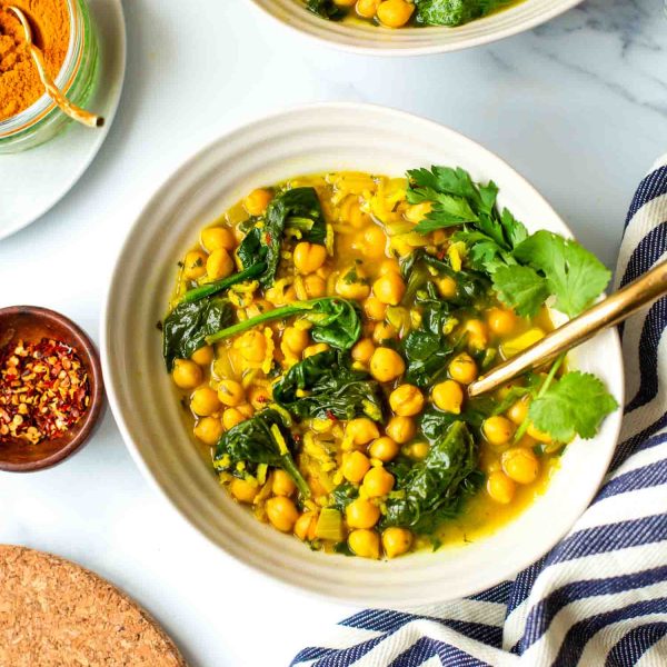 Persian Inspired Zesty Chickpea Soup topped with fresh herbs