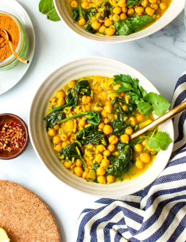 Persian Inspired Zesty Chickpea Soup topped with fresh herbs