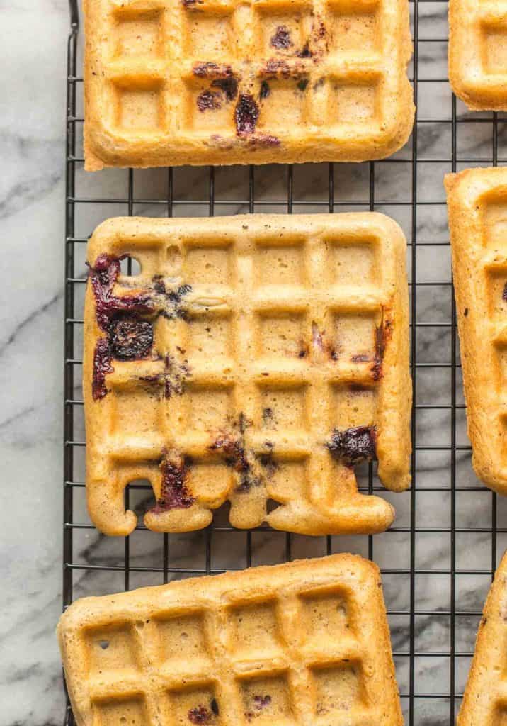 Gluten Free Blueberry Waffles cooling on a wire rack