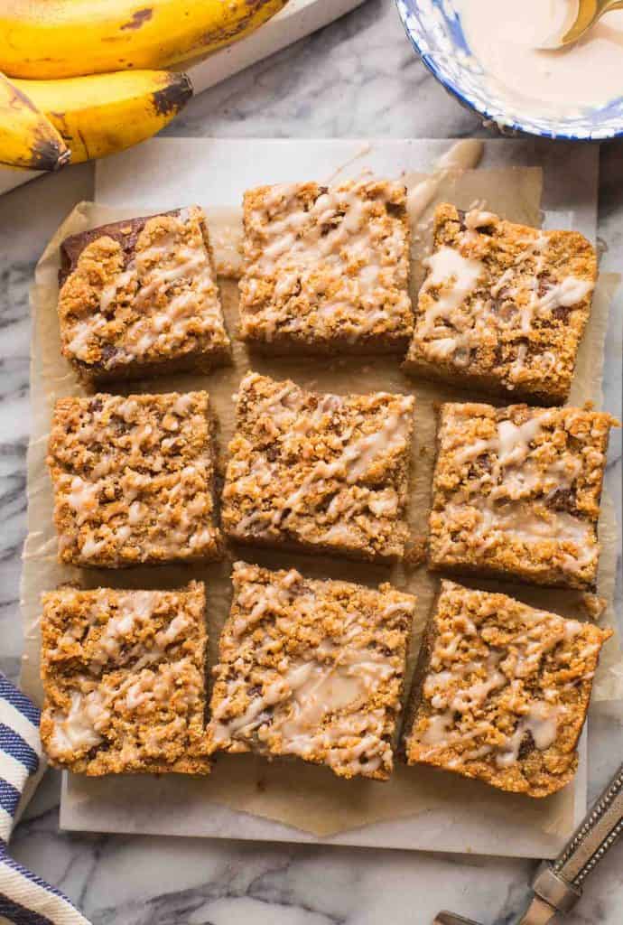 Paleo Banana Coffee Cake cut into slices on a cutting board