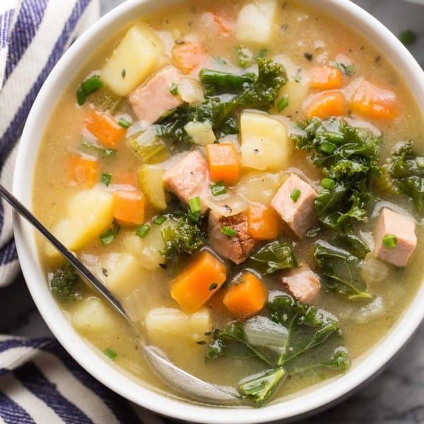 dairy free ham and potato soup in a white soup bowl