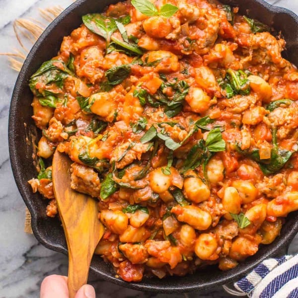 Fennel & Spinach Sausage Gnocchi in a large cast iron skillet