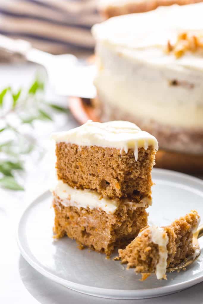 a slice of Gluten Free Carrot Cake on a small plate