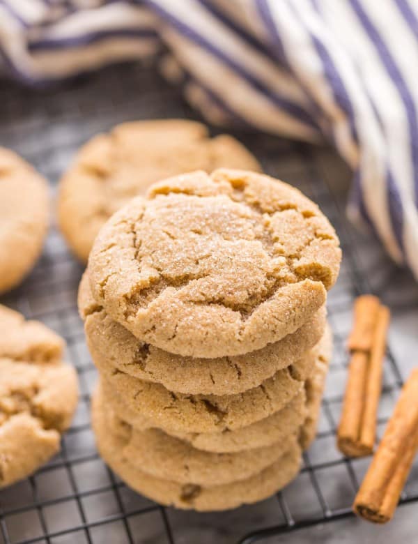 Almond Flour Snickerdoodles stacked on a wire cooling rack