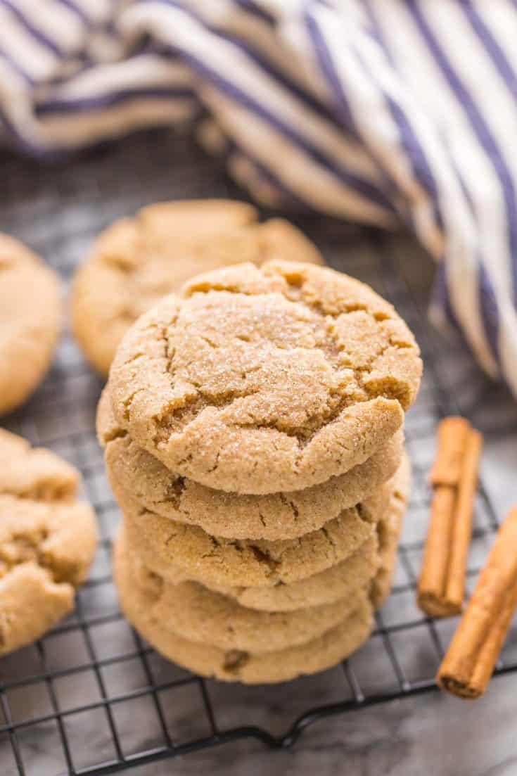 Almond Flour Snickerdoodles stacked on a wire cooling rack