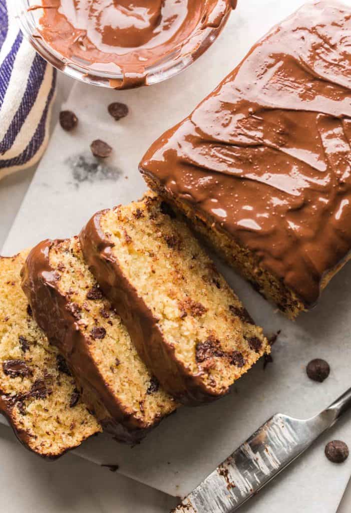 Grain Free Chocolate Chip Loaf Cake sliced on a cutting board