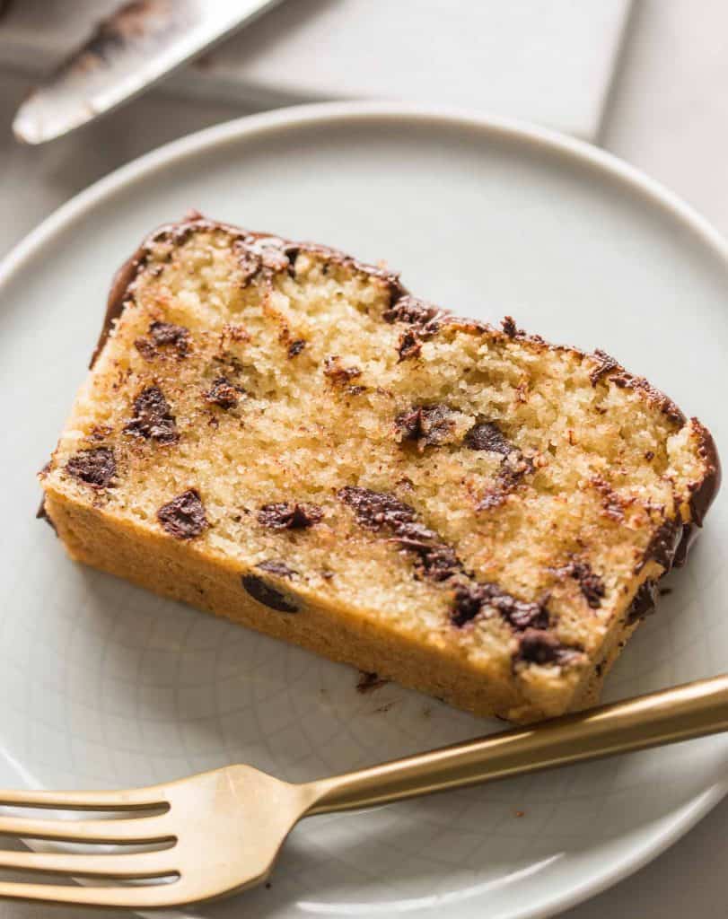 Grain Free Chocolate Chip Loaf Cake on a cake plate