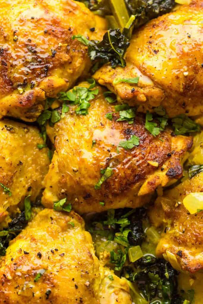 Coconut-Turmeric-Chicken-Thighs up close and sprinkled with cilantro