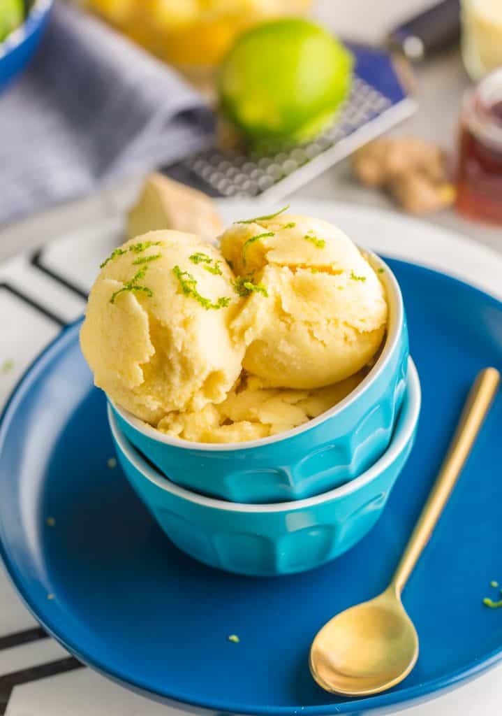 Pineapple Sorbet scoops in a blue ice cream bowl
