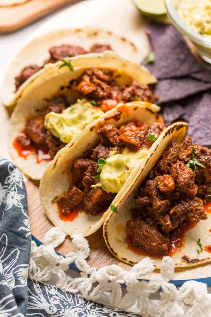 Instant-Pot-Adobada-Tacos_ on a wooden plate