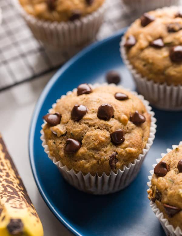 a few Banana Zucchini Muffins on a plate