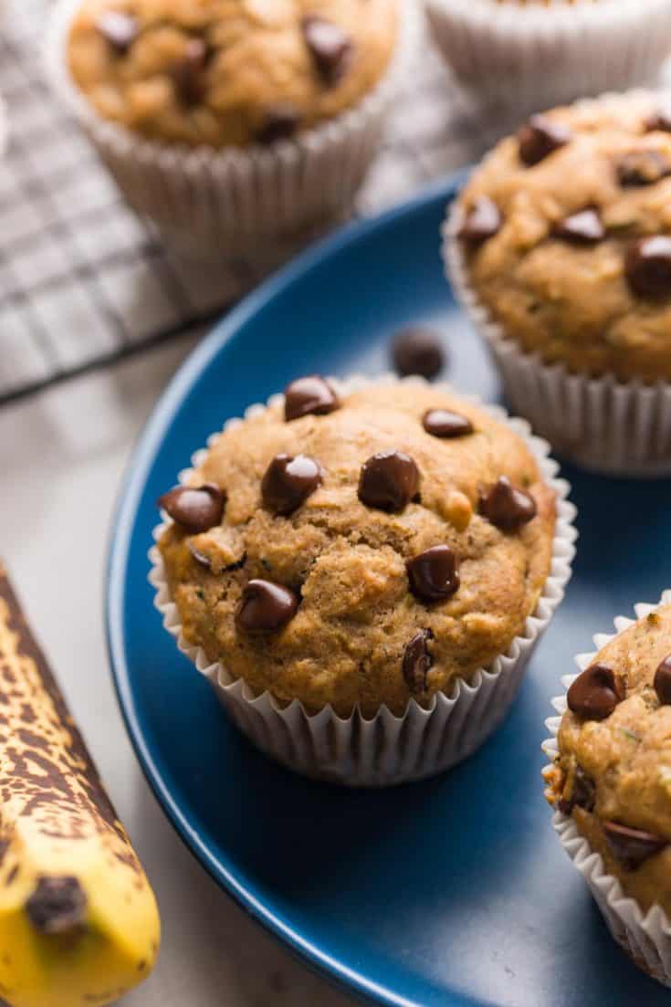 a few Banana Zucchini Muffins on a plate